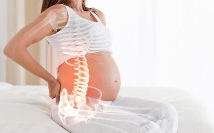 backache of pregnancy causes